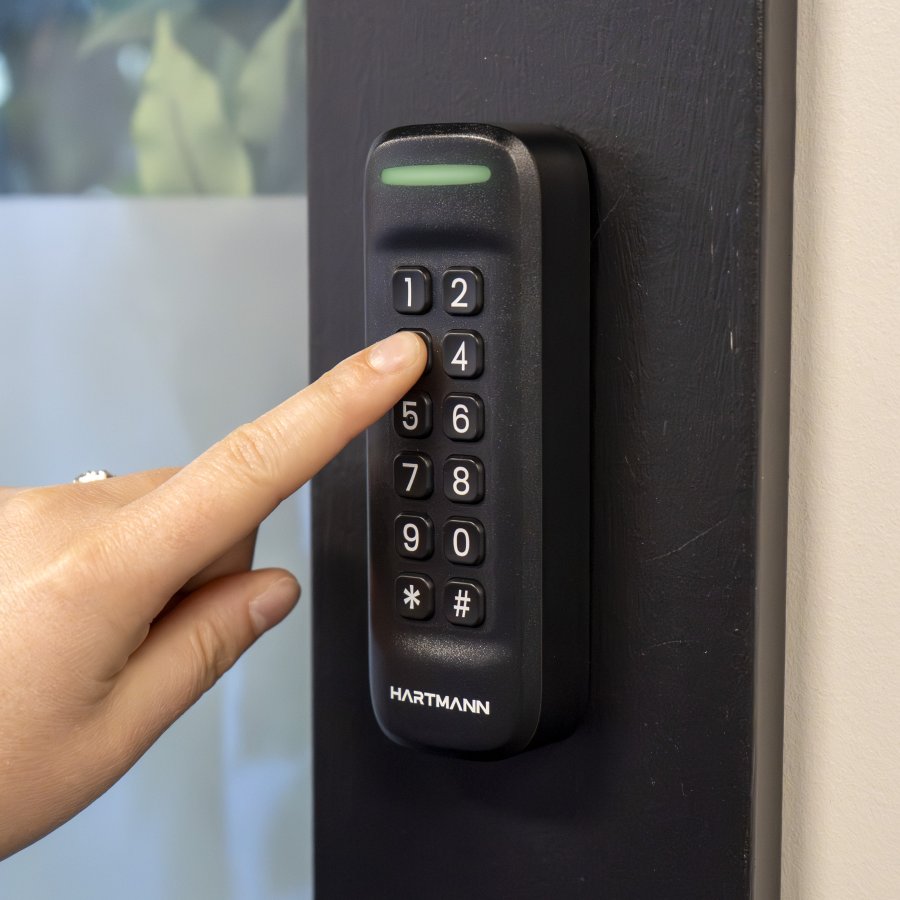 Hartmann AX-15 mullion-mount keypad in use with illuminated access indicator